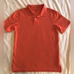 Crown & Ivy Boys Polo Shirt, Youth Large. Coral in color.